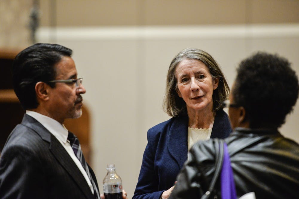 Gary Giron (left), executive director of the Alzheimer's Association of New Mexico and Dr. Janice Knoefel (center) speak with an attendee of the fifth annual Dementia Capable Providers: Person Centered Solutions conference, at the Sandia Resort and Casino. Dr. Knoefel was one of many speakers that presented at the conference Wednesday afternoon.