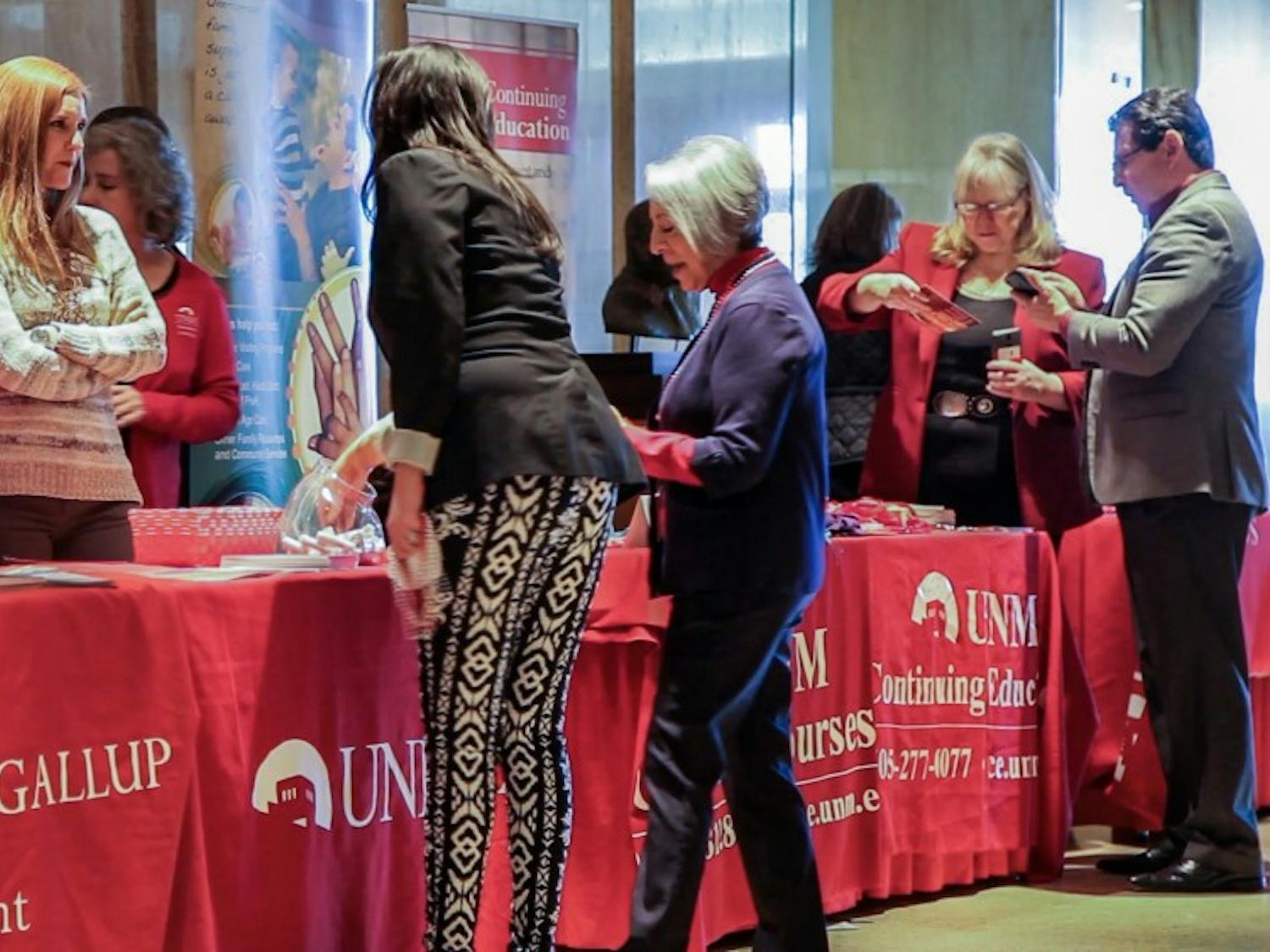 Members of nearly 30 UNM community organizations showcased their work to New Mexico state representatives and patrons of the state capitol building, on Monday, Jan. 30, 2017 in Santa Fe, New Mexico.