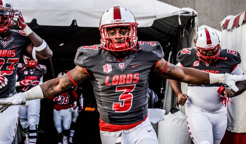 Richard McQuarley (CQ), Lobos Running Back soars out of the locker room tunnel after a lightning delay at  during the match-up against Air Force at Dreamstyle Stadium, Saturday, September 30, 2017. McQuarley scored 5 touchdowns and completed 179 total rushing yards to solidify a Lobos victory, 56-38