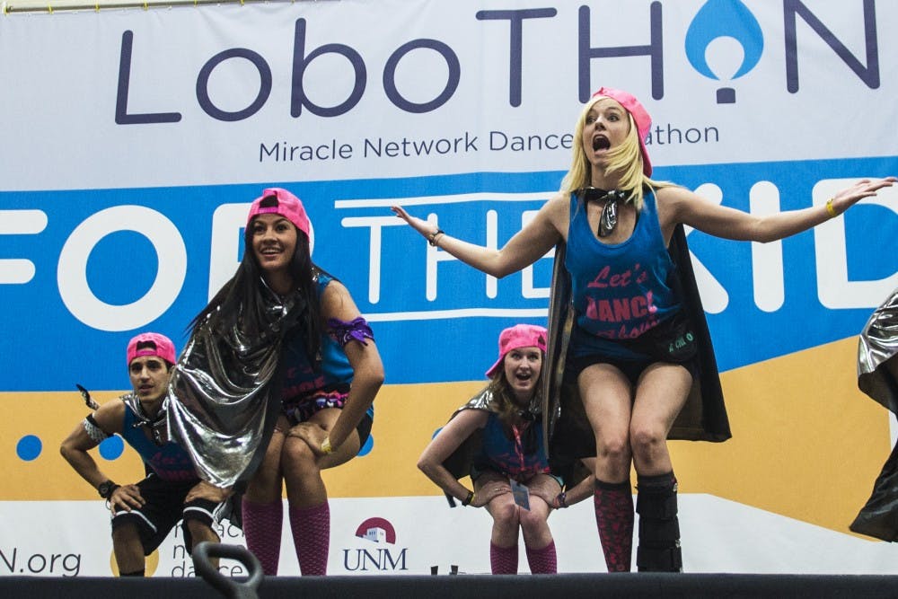 Dancers perform on a stage as part of the 2015 LoboThon. LoboThon is a dance marathon that is designed to help raise money for&nbsp;Children’s Miracle Network Hospitals. The 2016 marathon will be held April 2, 2016 at Johnson Gym.&nbsp;
