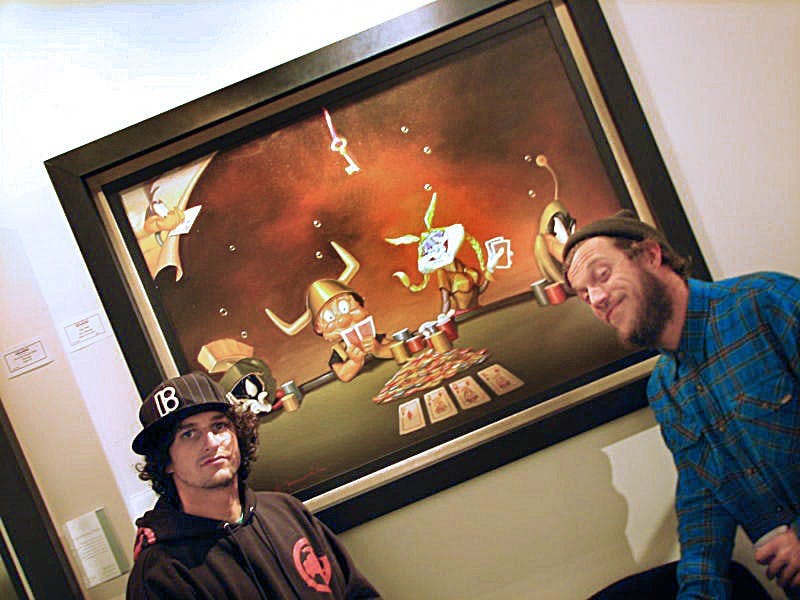 	Jacques Paisner, left, and David Moore, the founders of the Santa Fe Independent Film Festival, celebrate at an after party following their first event Saturday at the Chuck Jones Gallery. Paisner said UNM students will receive a discount if they want to screen a film at the film festival’s headquarters, the Santa Fe Complex.