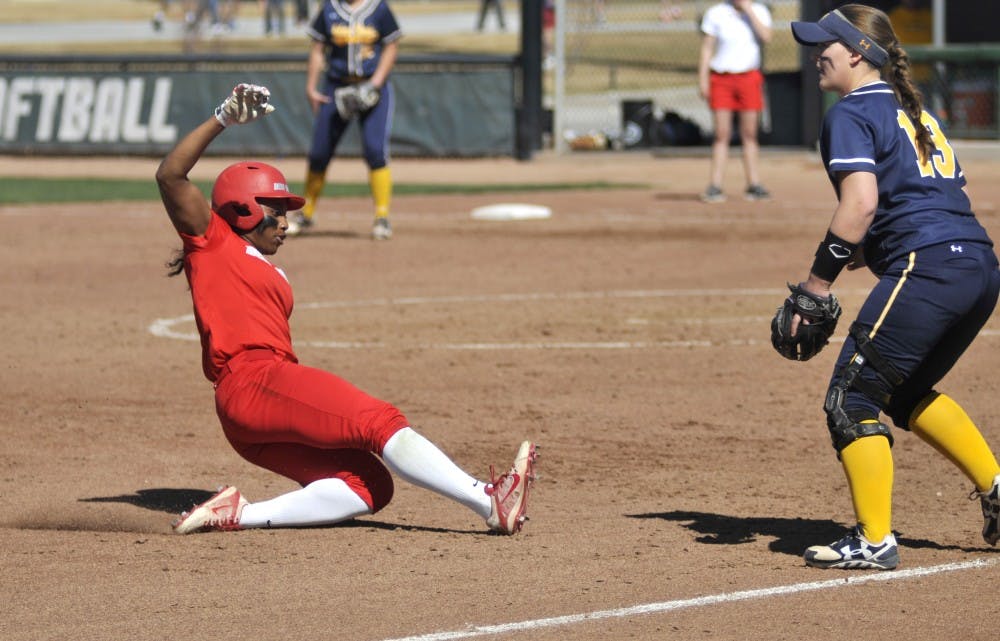 Senior outfielder Mariah Rimmer slides into third base Saturday afternoon at the Lobo Softball Field. The Lobos beat Northern Colorado in their first out of two game series 7-3.