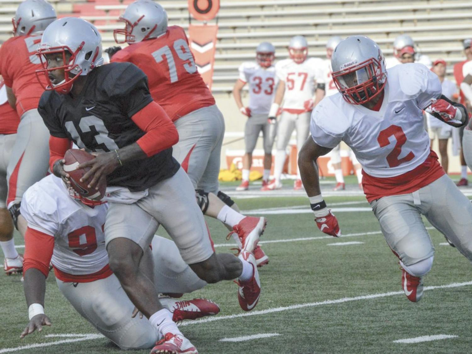 UNM redshirt sophomore quarterback Lamar Jordan runs the ball on Saturday evening. UNM’s first game will be against  Mississippi Valley State on Sept. 5 at University Stadium.