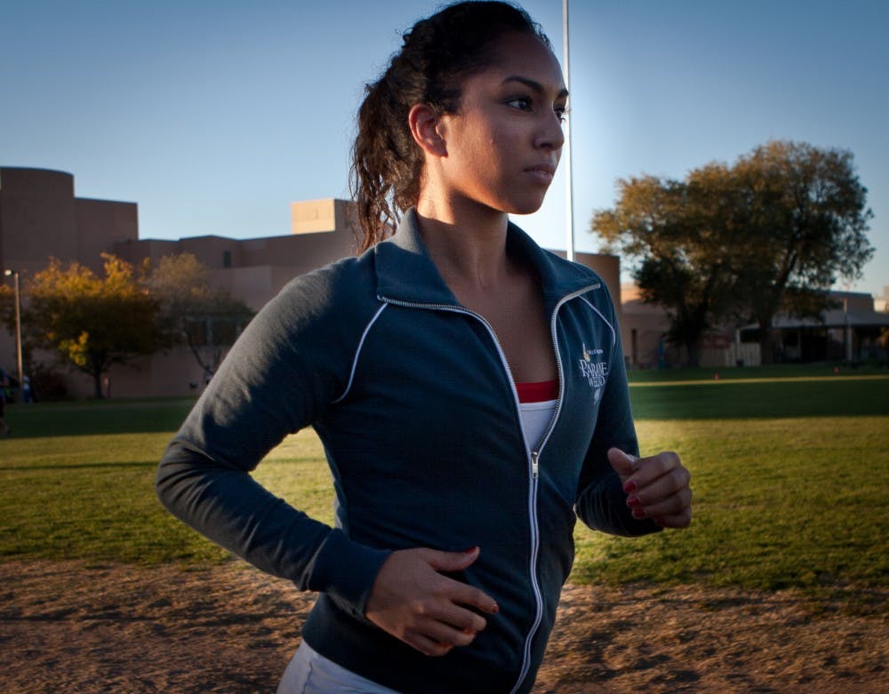 	Student Sita Huber jogs around Johnson Field on Tuesday. Huber placed eighth in a national beauty contest.