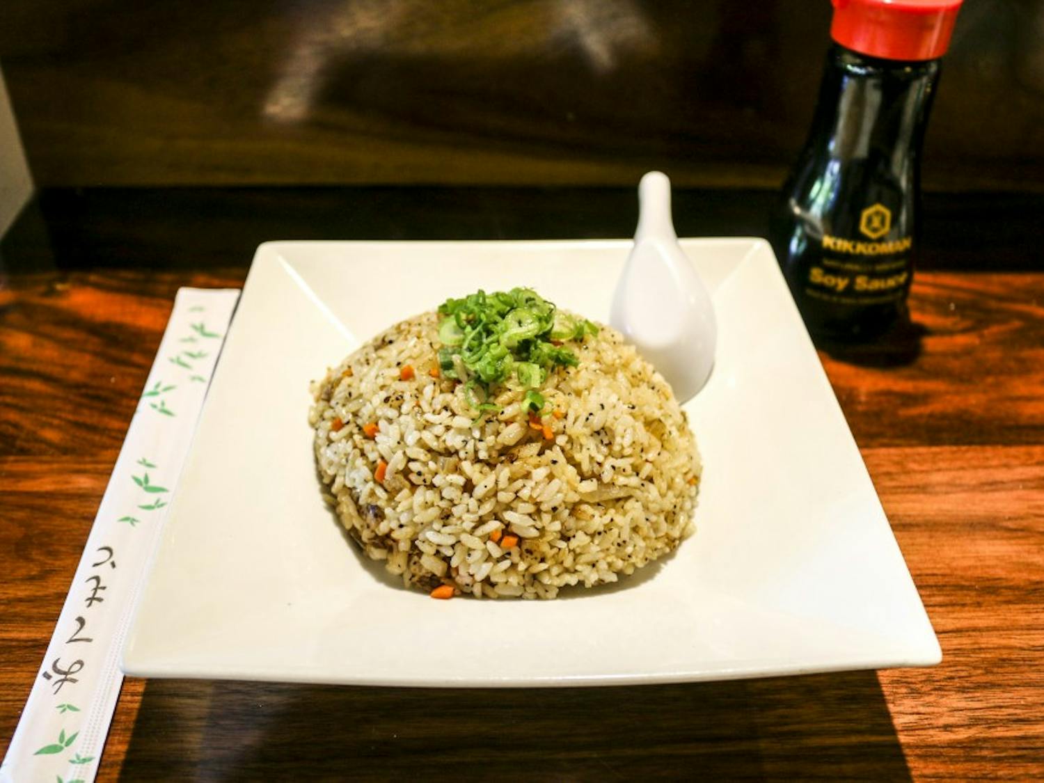 A bowl of vegan Japanese stir fry sits on the counter of Naruto on Wednesday, April 19, 2017. The Japanese stir fry is one of the many dishes that can be made vegan at Naruto.