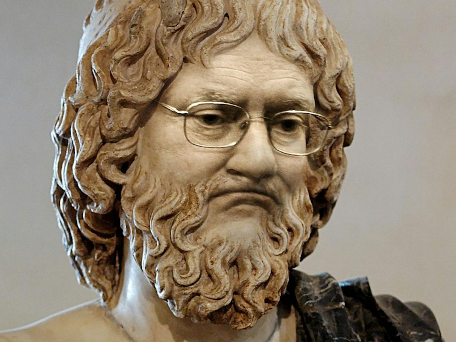 	In this photo illustration, “Schmidlius” is portrayed in a Greek statue. 