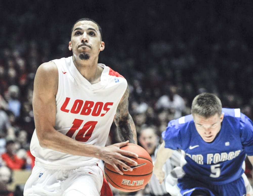 	Senior Lobo guard Kendall Williams prepares to go for a dunk during the Lobos game against Air Force at the Pit on Wednesday night. The Lobos defeated Air Force 80-52.