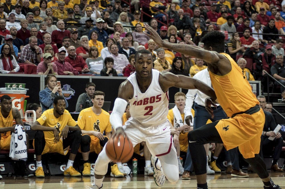Sam Logwood drives against Wyoming during the first half of Thursday's&nbsp;game at Thomas & Mack Arena in Las Vegas, Nevada. The Lobos won 85-75.