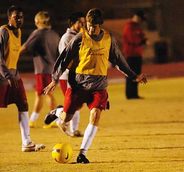 Midfielder Jack Smithson passes during practice on Thursday at Robertson Field. 