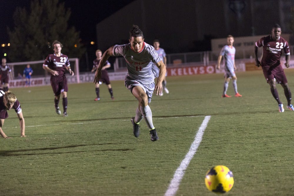 New Mexico midfielder Niko Hansen attacks the ball during the game against Missouri State on Sunday. The Lobos defeated the Bears 2-0.