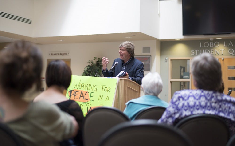 Nobel Peace Prize nominee John Dear speaks to a crowd gathered in the SUB Atrium Tuesday morning, discussing topics of world peace and his experiences combatting violence. Dear is a Catholic priest, author, lecturer and peace activist who leads an annual peace vigil at Los Alamos National Labs against the use of nuclear weapons. 