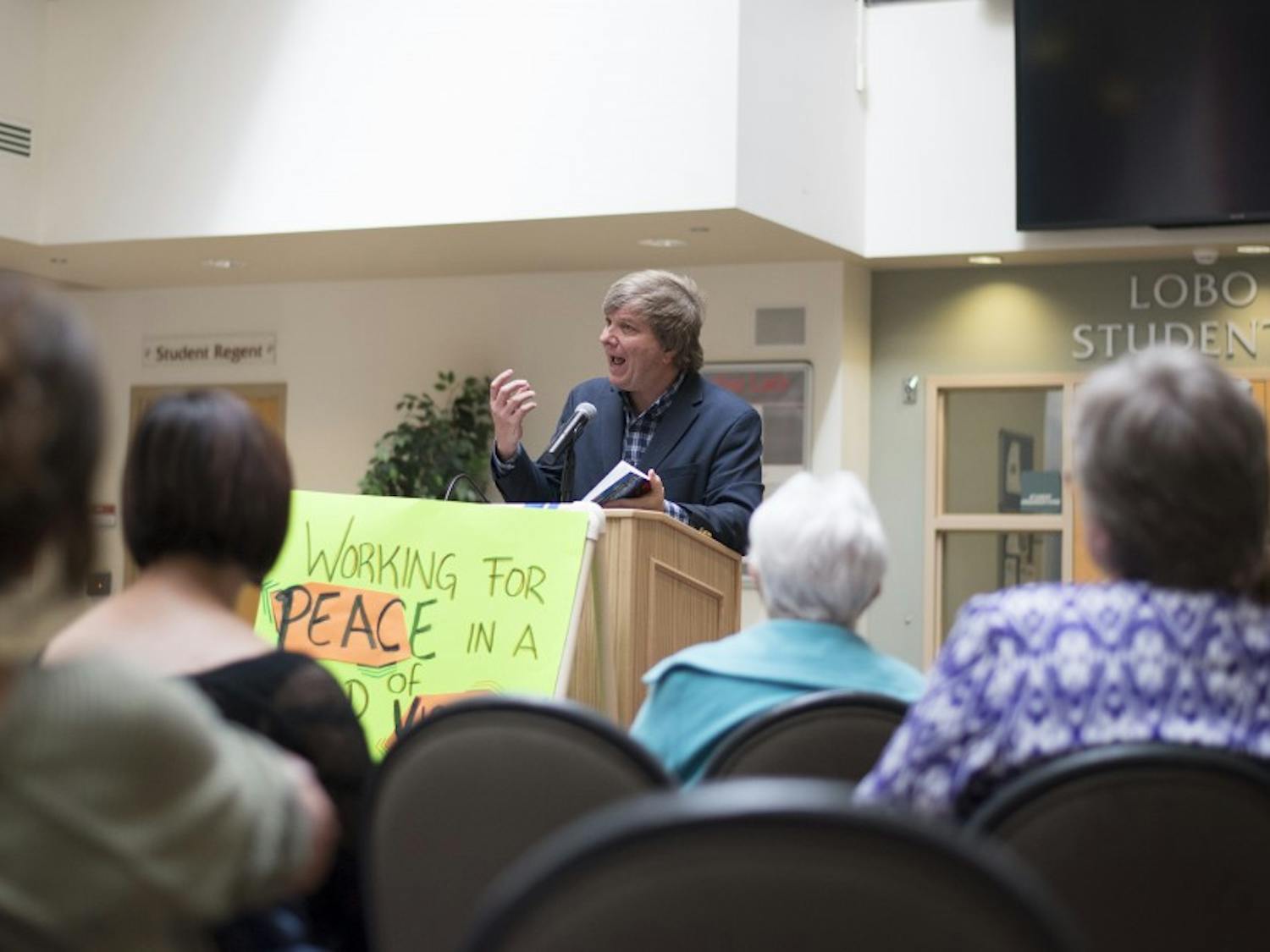 Nobel Peace Prize nominee John Dear speaks to a crowd gathered in the SUB Atrium Tuesday morning, discussing topics of world peace and his experiences combatting violence. Dear is a Catholic priest, author, lecturer and peace activist who leads an annual peace vigil at Los Alamos National Labs against the use of nuclear weapons. 
