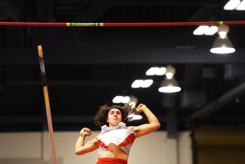 Freshman pole vaulter Jason Atencio looks up at the bar after vaulting over it during the Mountain West Championships at the Albuquerque Convention Center. The Lobos will compete in the NCAA Indoor Championships this weekend in Birmingham, Alabama.