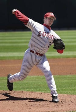 Junior pitcher Quentin Andes pitches against the University of Arizona at Isotopes Park on Tuesday. Andes pitched eight innings and helped lead the Lobos to their 13-3 win.