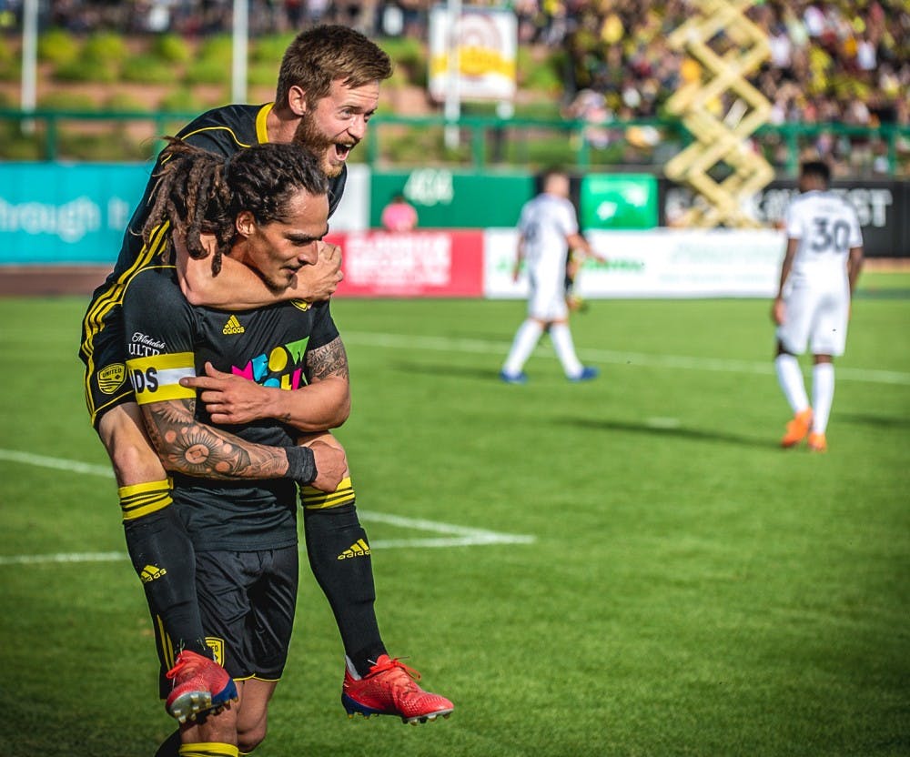 NM United players celebrate