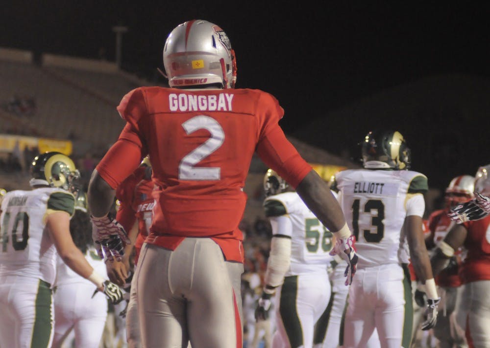	UNM running back Crusoe Gongbay walks from the end zone during a game against CSU last season on Nov. 16, 2013. 


