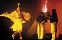 An American-Indian dancer and drummers perform as a part of the opening to the Miss Indian World talent show at the Albuquerque Convention Center on Thursday. The winner of the competition will be announced Saturday at the Gathering of Nations in The Pit.