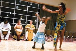 Six-year-old Shanice Harris dances in a performance by Odigbo Adama, an African dance group, during the Winter Roots Festival in the SUB on Saturday.