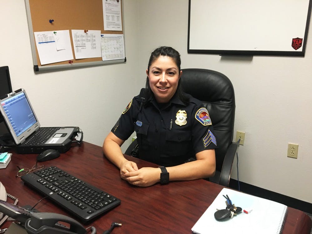 Sergeant Hollie Anderson starts off a 10-hour shift by reviewing cases in her office on Friday morning.