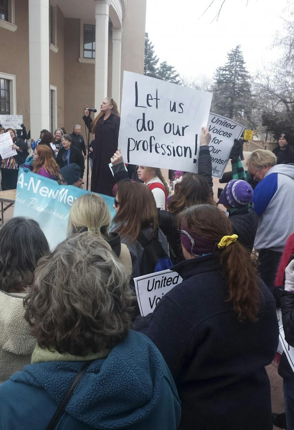 Teachers gather on Monday afternoon at the Roundhouse in Santa Fe to protest legislative proposals that could be detrimental to the education profession.