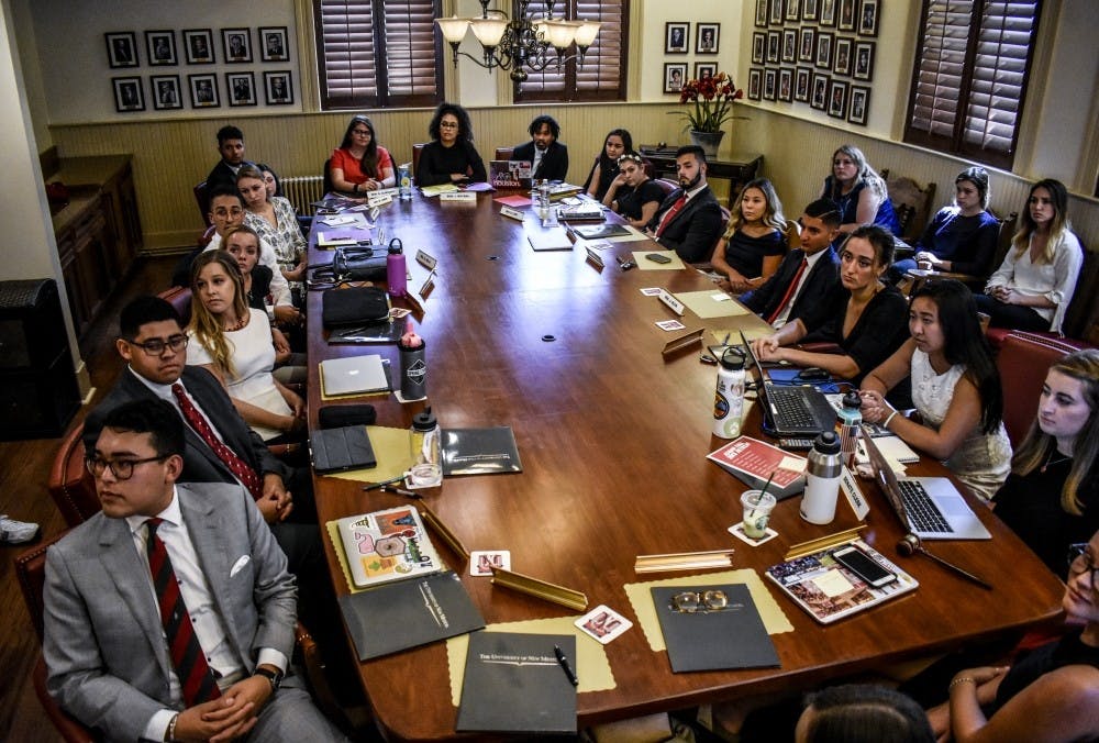 Associated Student of the University of New Mexico senators and cabinet listen to Finnie Coleman address the body.