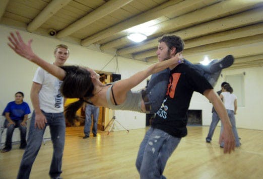 Arin Herrman and Ky Lampkin swing dance at the Heights Community Center on Tuesday. The community center offers classes Tuesdays at 7:30 p.m.