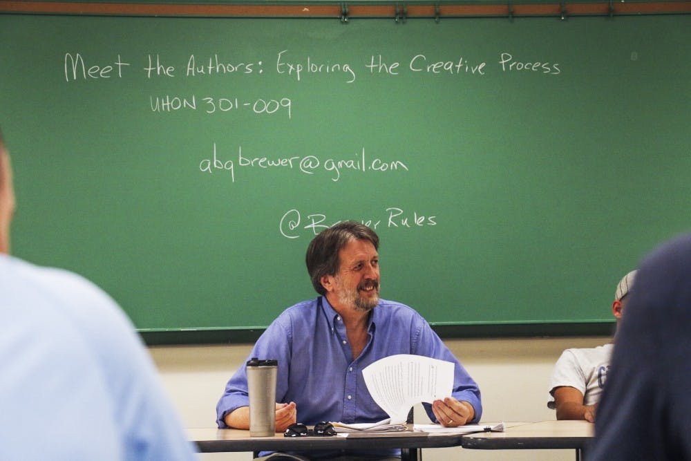 Steve Brewer addresses his Honors College course, "Meet The Authors." The class works in conjunction with an Honors Forum series that invited local writers to speak at lectures that are open to the public.&nbsp;