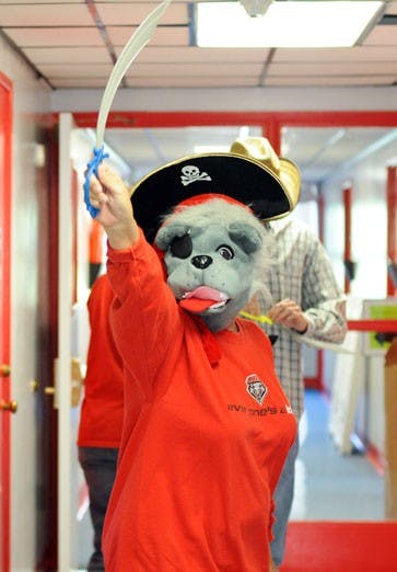 Nicole C. Hudson joins in the Campus Decorating Contest at the Accessibility Resource Center on Tuesday. 