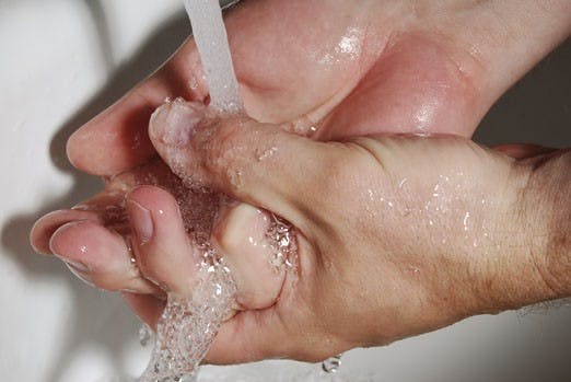 The Center for Disease Control recommends hand washing and other routine hygienic measures to prevent the spread of  swine flu. Photo  illustration