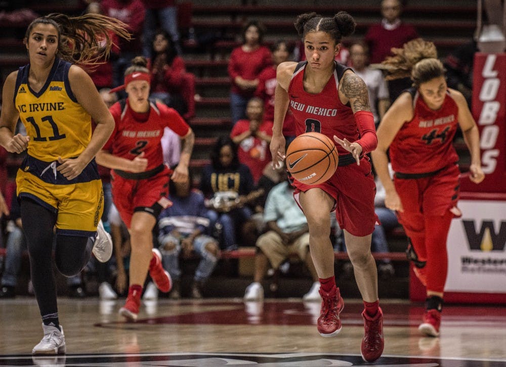 Cherise Beynon (CQ) dribbles down the court during the Lobos second match-up of the UNM Thanksgiving Tournament, November 25, 2017. The Lobos defeated the Anteaters, 83-61, making the women 6-0 this season. 