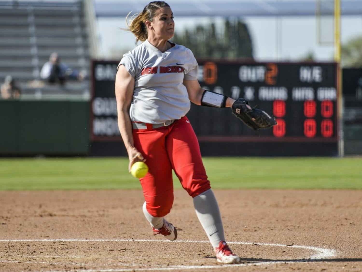 Senior pitcher Lisa Rodrigues pitches against a San Diego State batter Friday afternoon at the Lobo Softball Field. The Lobos lost to the Aztecs 23-4.&nbsp;