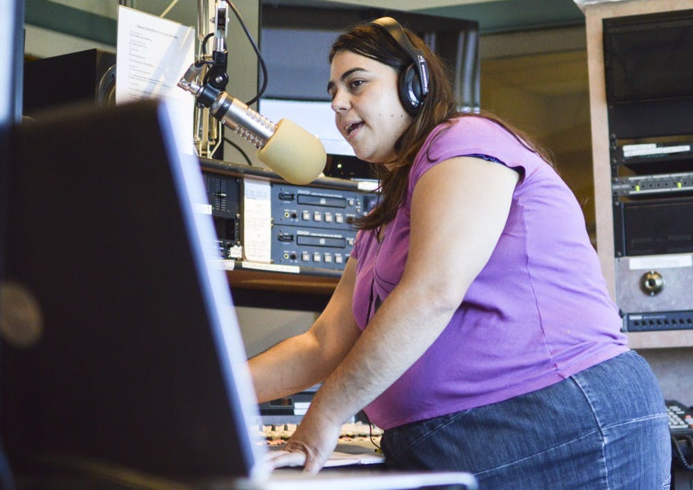 	Host Melanie Sanchez, also known as DJ Mello, speaks on the air during the Afternoon Freeform music segment at KUNM on Monday afternoon. KUNM has launched a new platform, created by Radio Free America, which has features that will allow listeners to chat live with on-air DJs and Program Hosts.