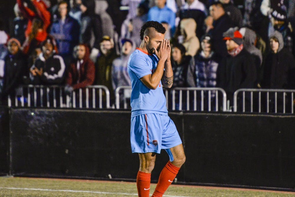 Senior forward Niko Hansen reacts after nearly missing a shot on a University of Portland goalkeeper Thursday, Nov. 17, 2016 at the UNM Soccer Complex. The Lobos lost against No. 14 Washington University Sunday night in the second round of the NCAA Tournament, ending their season.&nbsp;