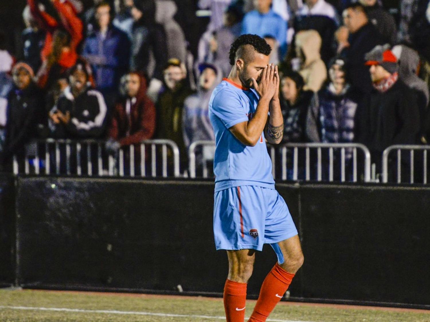 Senior forward Niko Hansen reacts after nearly missing a shot on a University of Portland goalkeeper Thursday, Nov. 17, 2016 at the UNM Soccer Complex. The Lobos lost against No. 14 Washington University Sunday night in the second round of the NCAA Tournament, ending their season. 