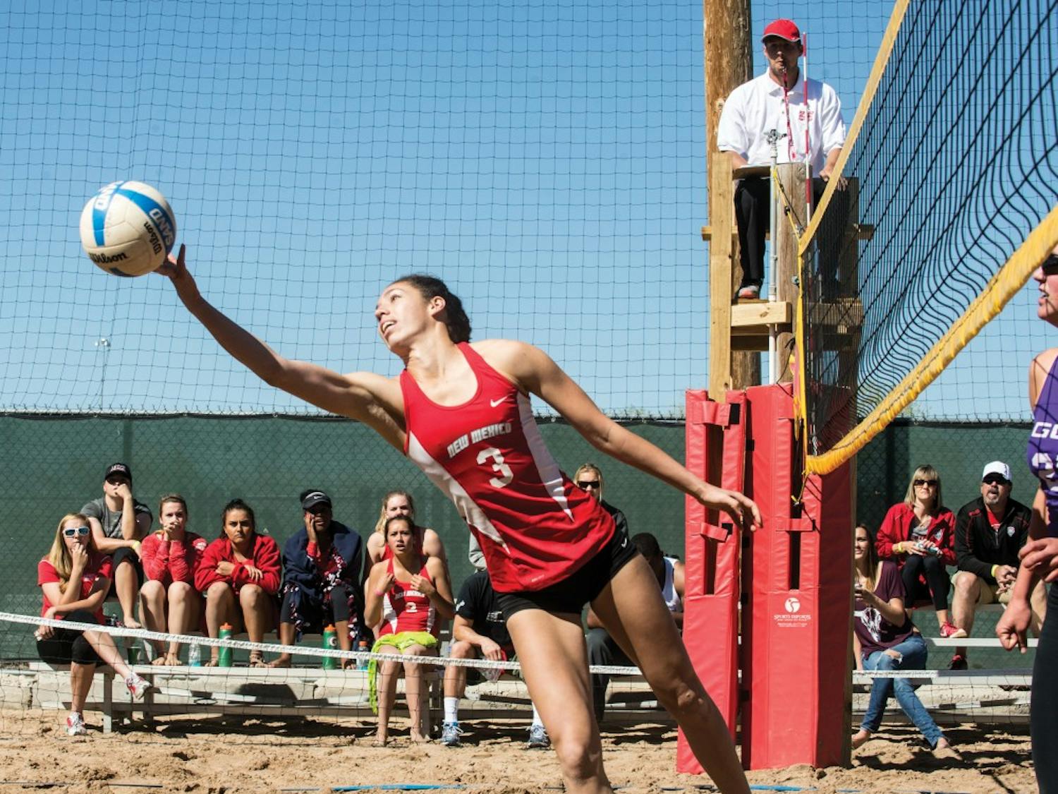Ashley Kelsey reaches for the ball during the Lobos’ game against Grand Canyon on Mar. 21. The beach volleyball team will hold tryouts Sept. 29 through Oct. 1.