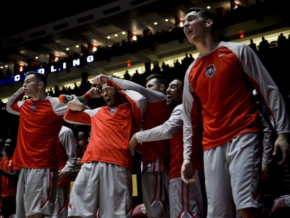 The Lobo bench erupts in excitement as they make a basket at WisePies Arena Wednesday night. The Lobos will play Rice this Saturday at 6 p.m..&nbsp;&nbsp;