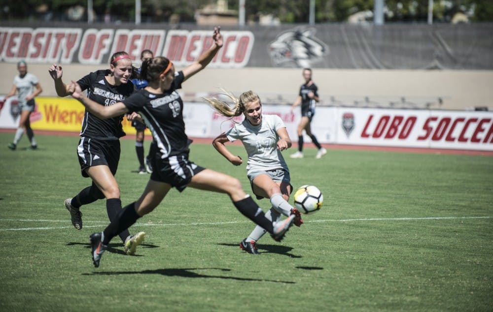 Madi Hirschman shoots during the second half of Sunday's game at the UNM Soccer Complex. The Lobos won 5-0.