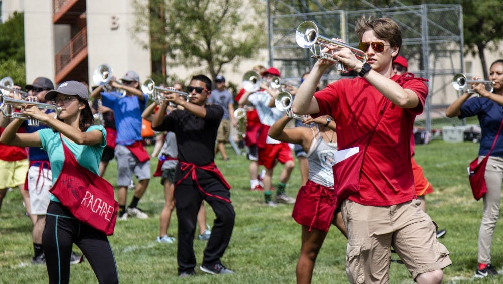 Students practice drills on Johnson Field during their weekly practice.