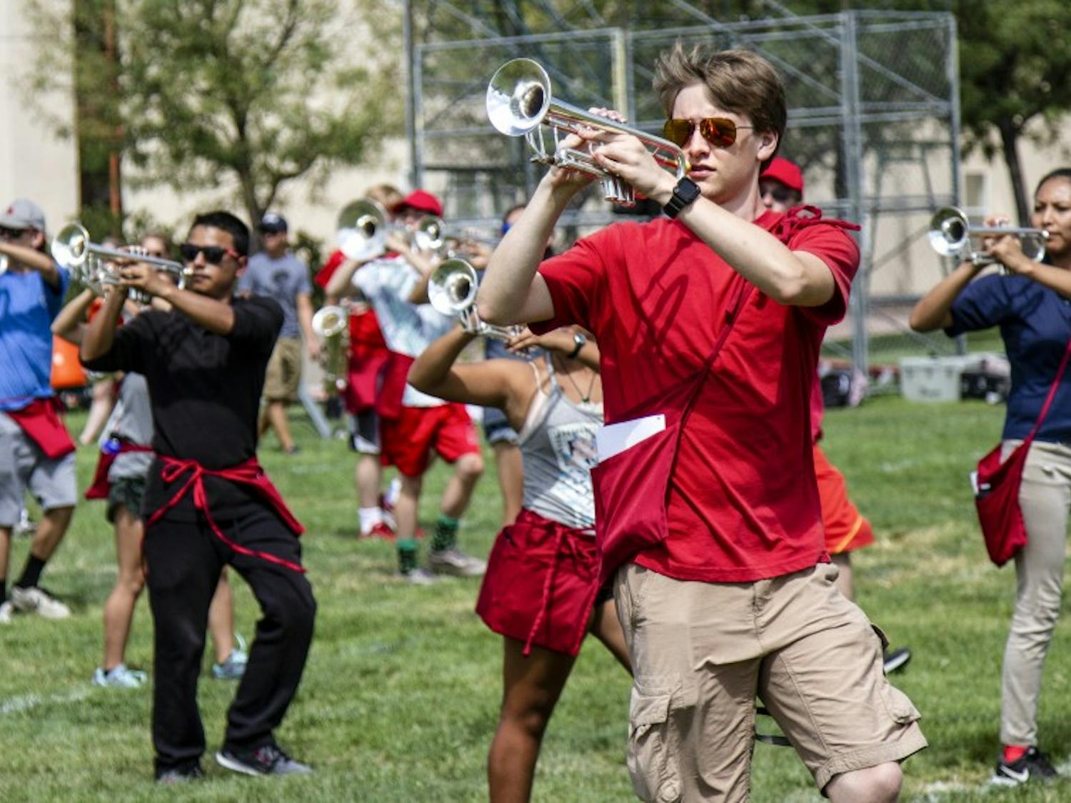 Students practice drills on Johnson Field during their weekly practice.