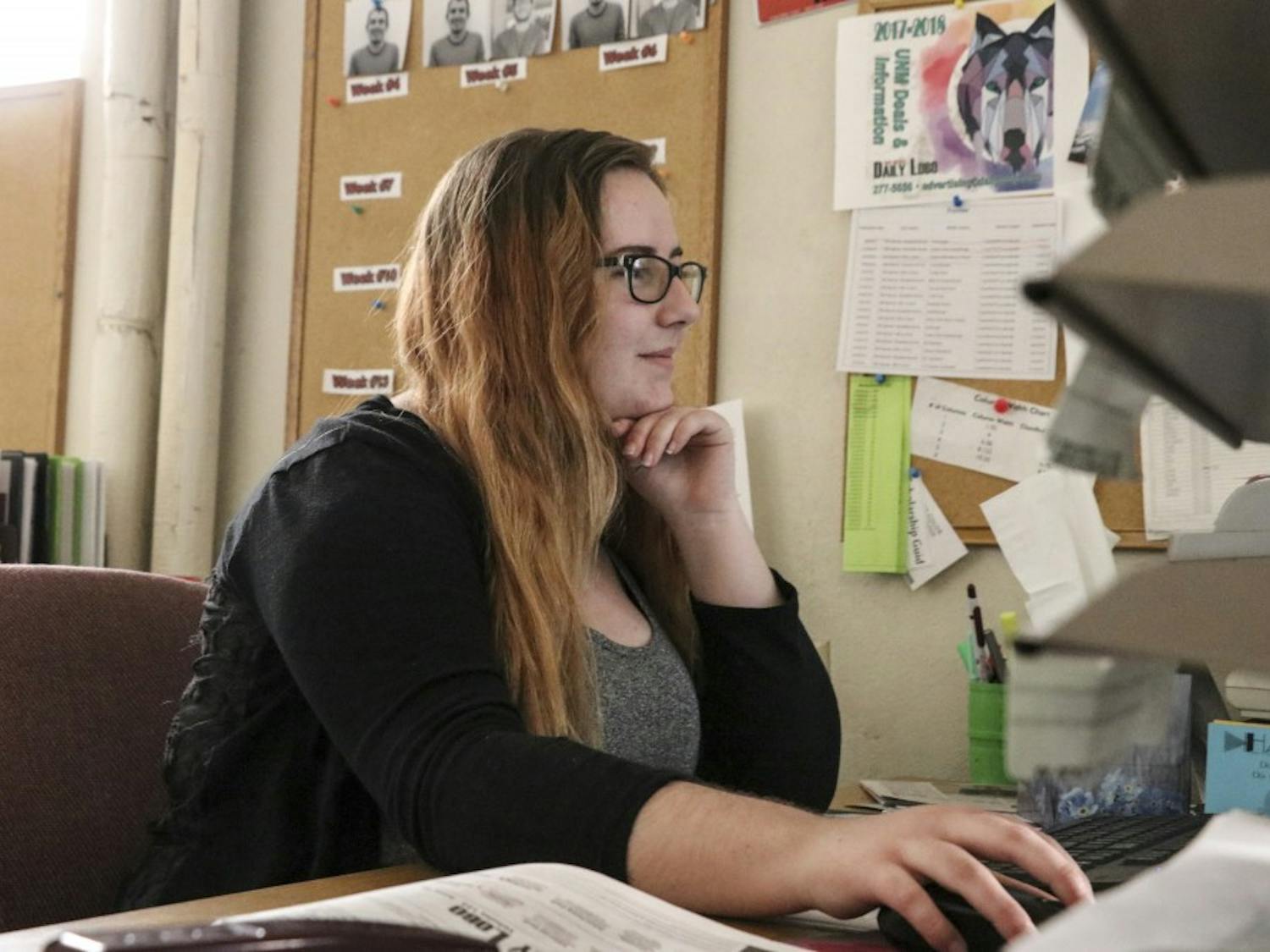 Amy Byres works at her desk in the Daily Lobo ad office on the afternoon of Feb. 4, 2018. 