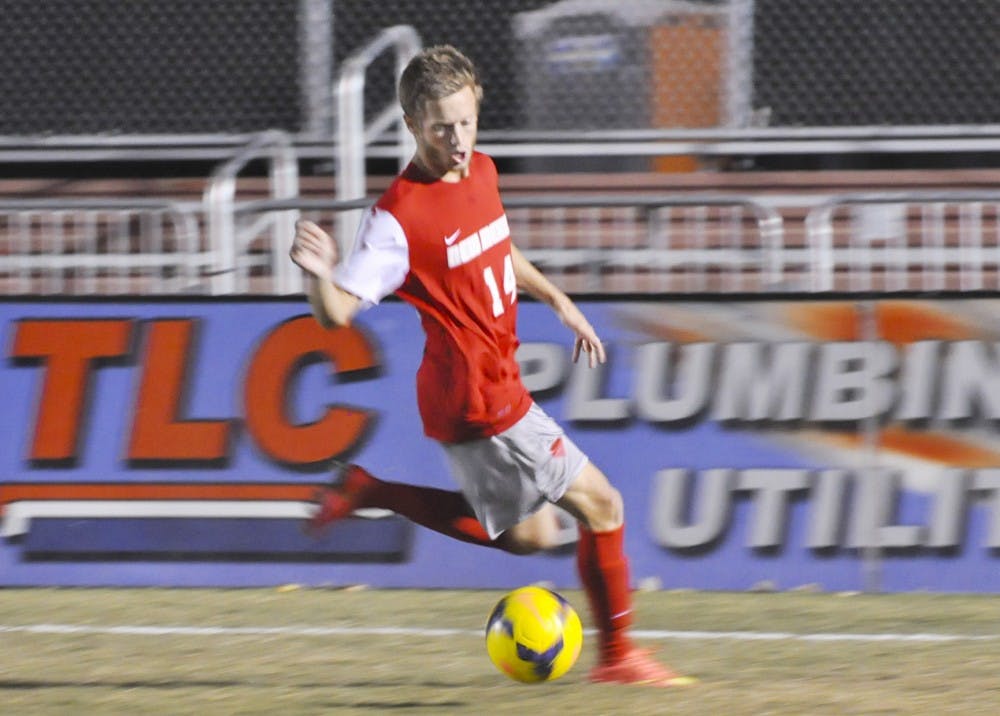 UNM midfielder Christopher Wehan races to gain control of the ball during Saturday’s game against Marshall.  The Lobos lost 2-1.