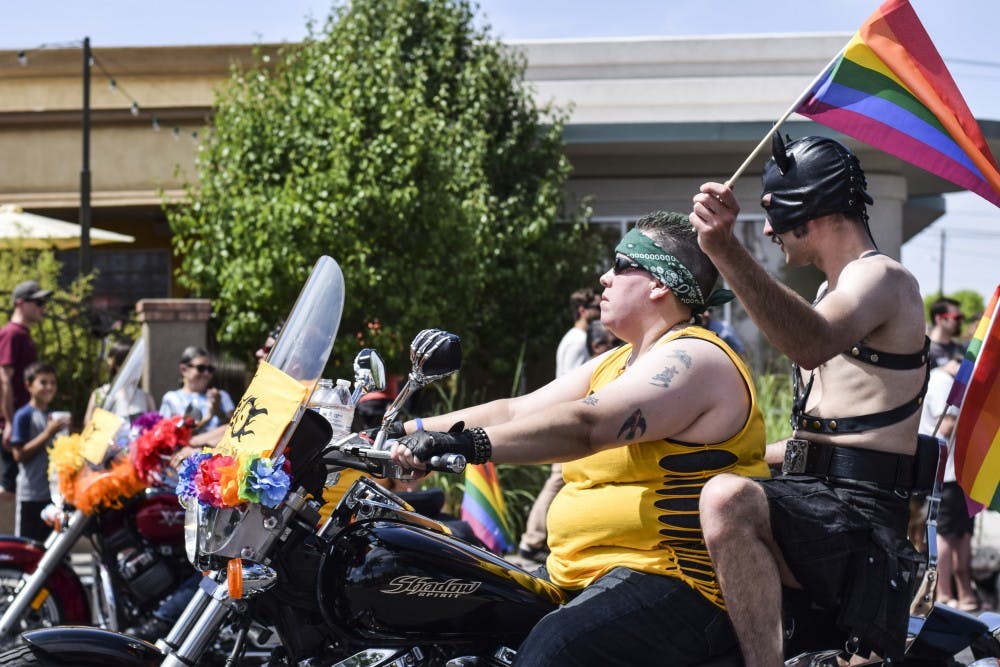 Supporters of the 2016 Pride Parade ride along Central Avenue with other motorcycle riders as they lead various floats Saturday morning. The parade spanned the stretch of central from Girard Boulevard to Louisiana Boulevard.&nbsp;