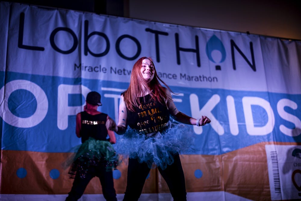 Morale captains, students who aimed to motivate the crowd, took the stage to lead participants in a choreographed dance at UNM's LoboTHON on March 3, 2018.