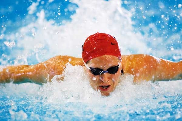 Swimmer Ashley Grisdale practices the breast stroke on Thursday at Johnson Natatorium. 