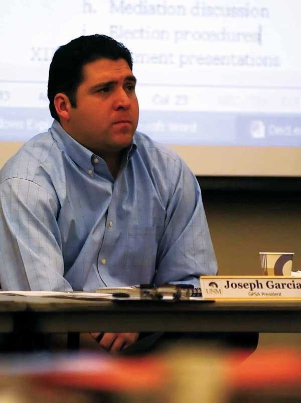 GPSA President Joseph Garcia listens during a meeting in the SUB on Saturday when a petition was presented to recall him.