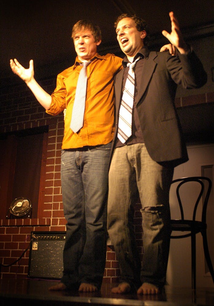 Members of the Pajama Men, Shenoah Allen, left, and Mark Chavez, perform Saturday at the Stove at 114 Morningside Drive N.E.  