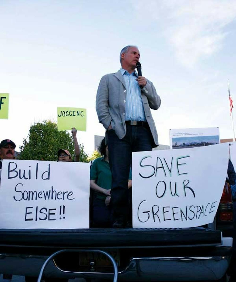 Mayor Martin Chavez speaks during a rally at the North Golf Course on Sunday. A group met with President David Schmidly after the rally to discuss the future of the course. 