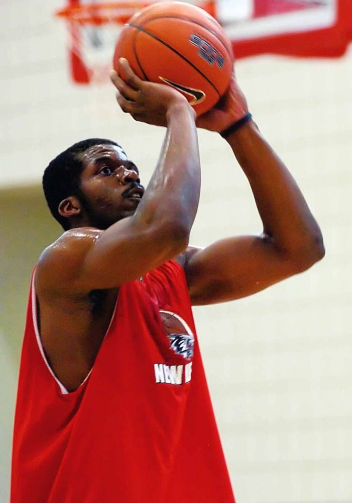 Forward Tony Danridge shoots a free throw at practice on May 25 at the Rudy Davalos Basketball Center. 