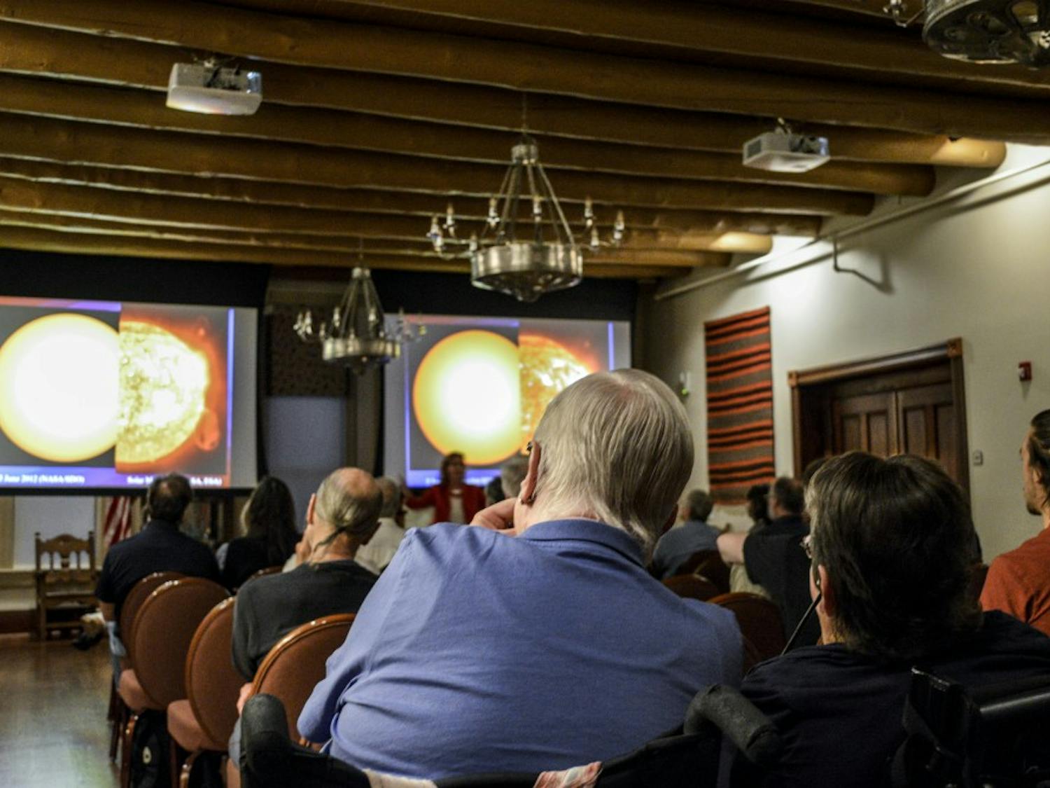 Community members listen to a lecture titled “Our Abundant Universe,” presented by the New Mexico Philharmonic Music and Arts Festival on April, 24, 2018.