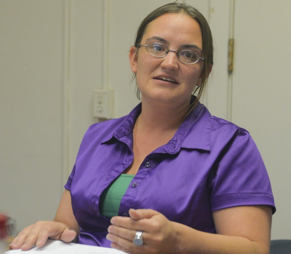 Daily Lobo Editor in Chief Jyllian Roach delivers the report at the Student Publications Board meeting on Friday. Roach got selected to the editor-in-chief position at the Daily Lobo for 2015-16.